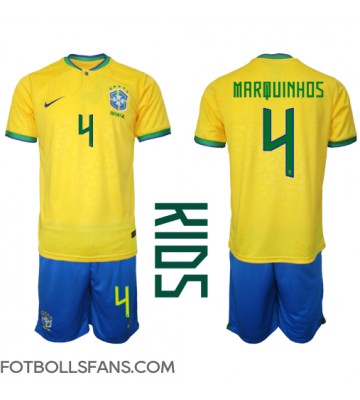 Brasilien Marquinhos #4 Replika Hemmatröja Barn VM 2022 Kortärmad (+ Korta byxor)